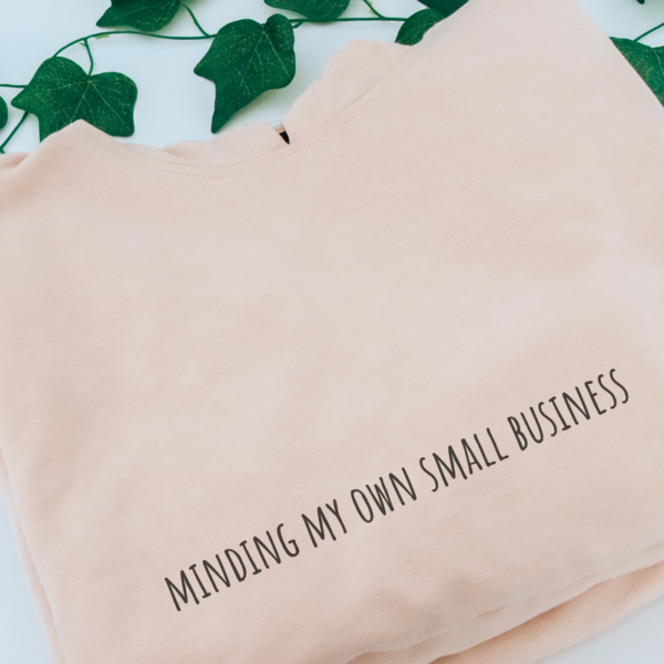 minding my own small business hoodie folded